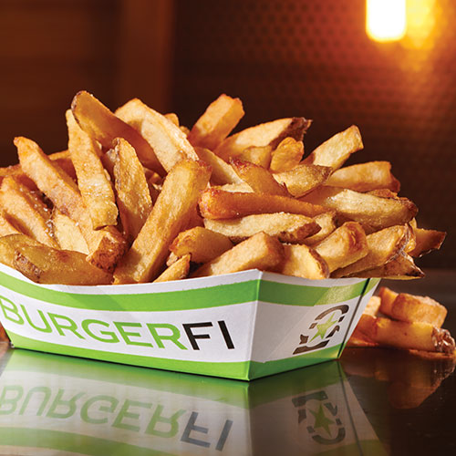 A plate of crispy French fries from BurgerFi.