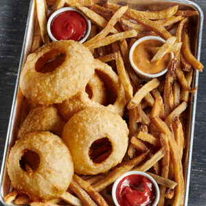 French fries and onion rings from BurgerFi. 