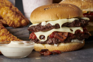 A BurgerFi burger paired with aioli.