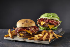 Reheating fries is easy with this delicious meal! Two juicy burgers with all the fixings and a side of crispy French fries.