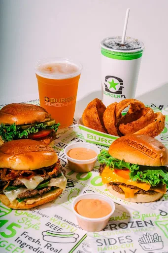 An assortment of burgers and sauces from BurgerFi