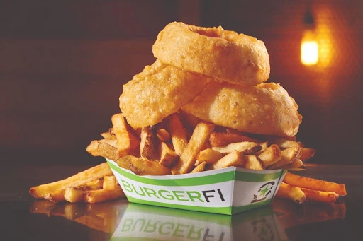 BurgerFi’s signature French fries and onion rings